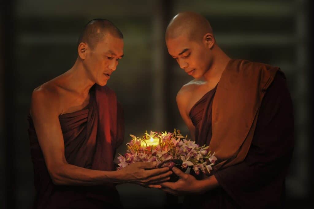 The image is of two Buddhist monks.  Buddhists have much to teach us about the ego and how to overcome its destructive properties. 